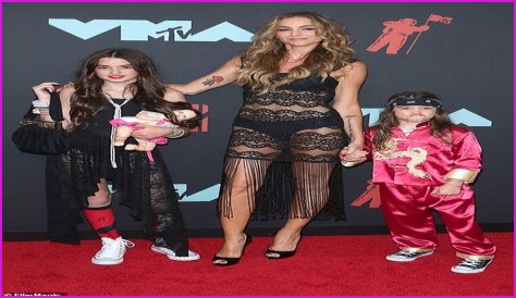 Drea de Matteo, 47, poses with her daughters Waylon and Alabama