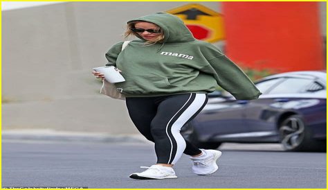 Olivia Wilde keeps a low profile in hoodie and sunglasses as she hits gym for morning workout in LA